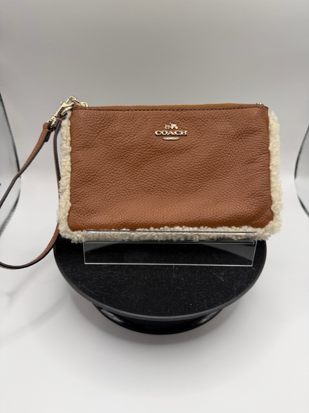 COACH Brown Pebbled Leather Wristlet with Shearling Trim